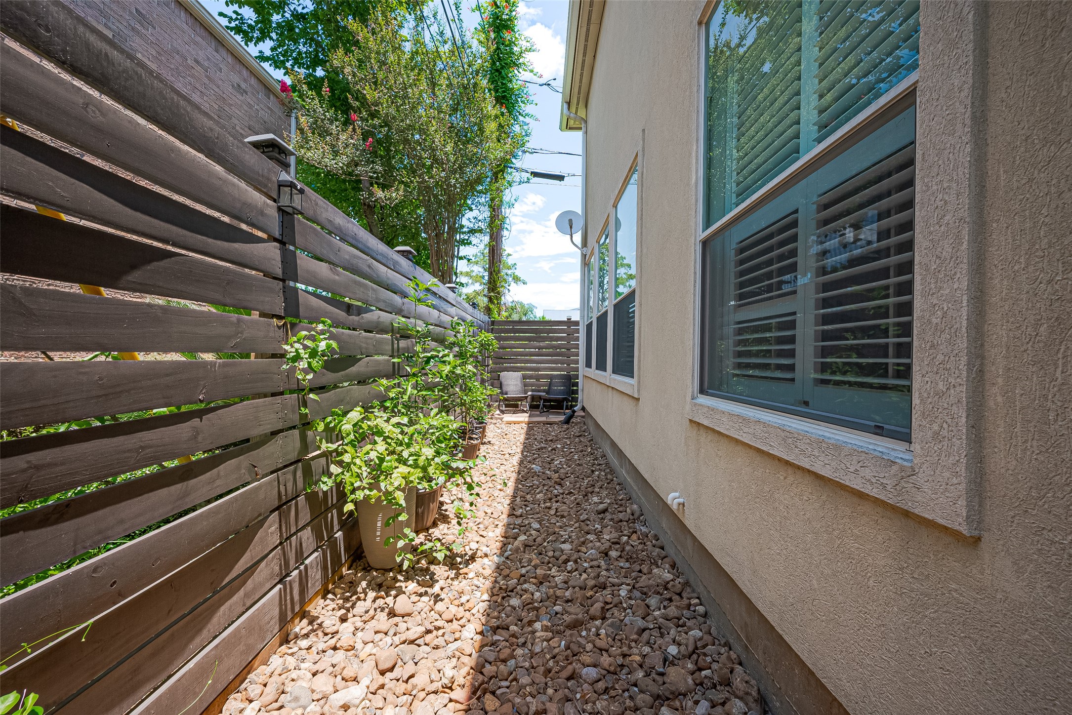 1413 Whispering Pines Drive, Unit 5 Houston, TX 77055 - Photo 47 of 47 a view of a pathway both side of house