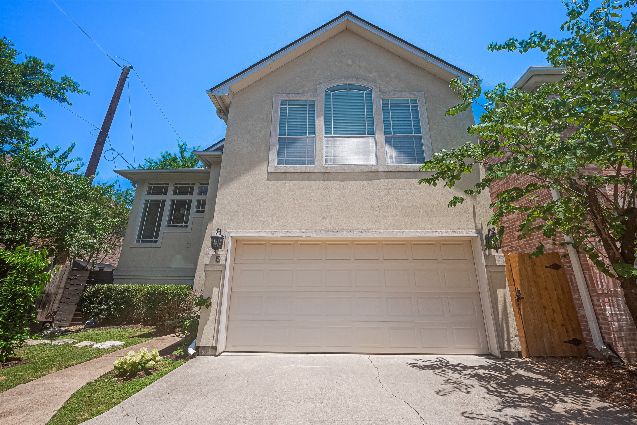 1413 Whispering Pines Drive, Unit 5 Houston, TX 77055 - Photo 5 of 47 front view of a house
