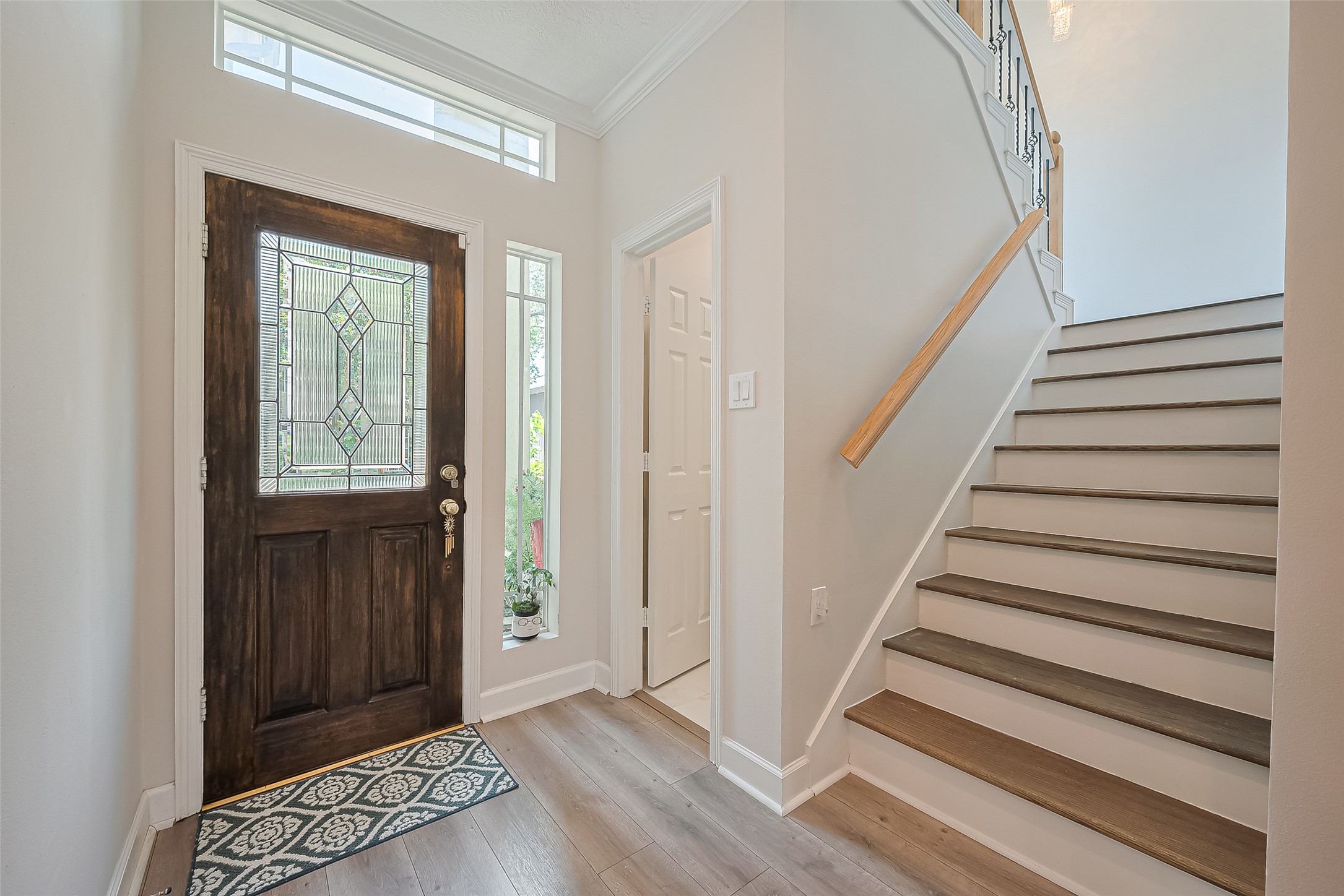 1413 Whispering Pines Drive, Unit 5 Houston, TX 77055 - Photo 8 of 47 a view of entryway with stairs