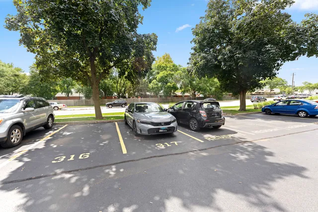 a view of a street with cars