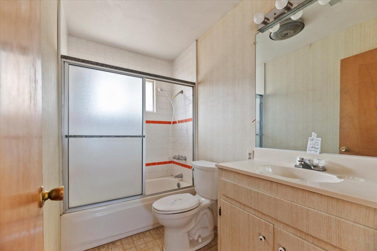 61313 El Coyote Lane Joshua Tree, CA 92252 - Photo 31 of 48 a bathroom with a sink toilet and shower