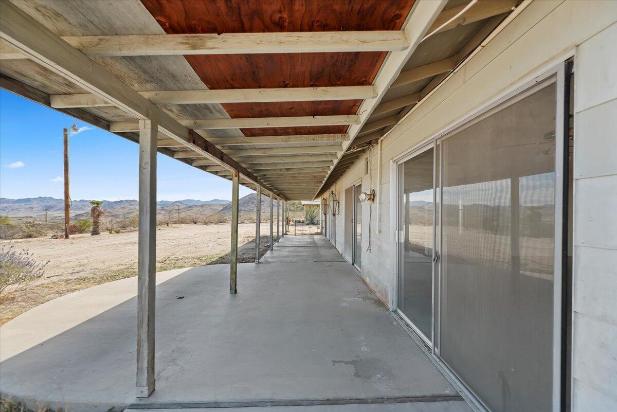 61313 El Coyote Lane Joshua Tree, CA 92252 - Photo 7 of 48 a view of a porch