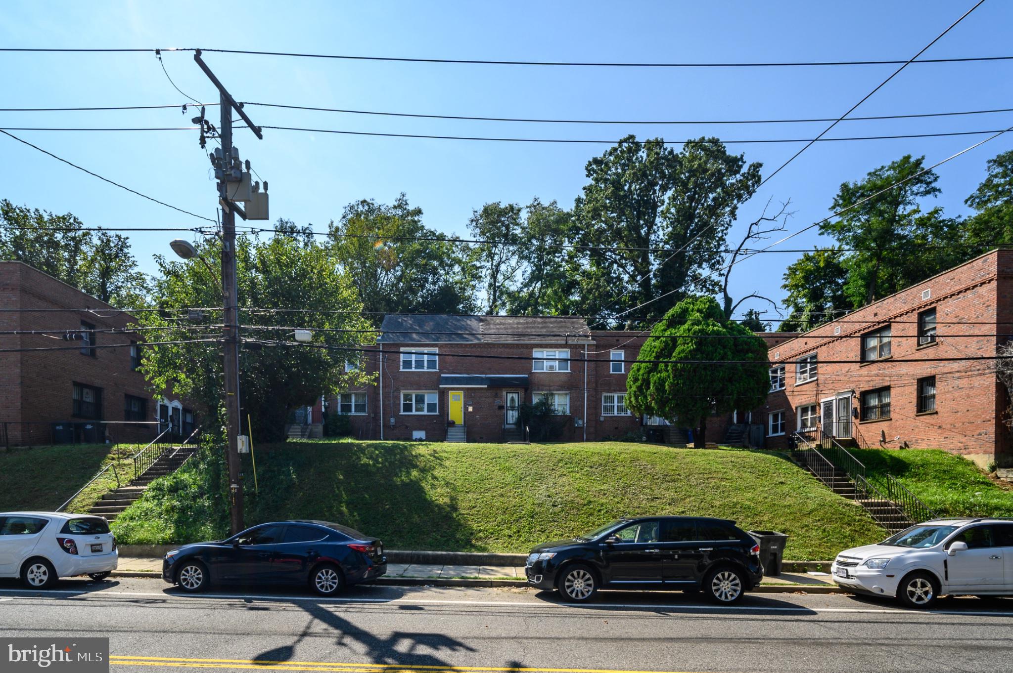 5053 Sheriff Road Northeast Washington, DC 20019 - Photo 24 of 32 Charming brick apartments in green setting.
