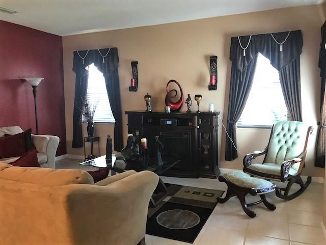 1270 Rose Gate Boulevard Riviera Beach, FL 33404 - Photo 5 of 25 1270 Rosegate living room 2