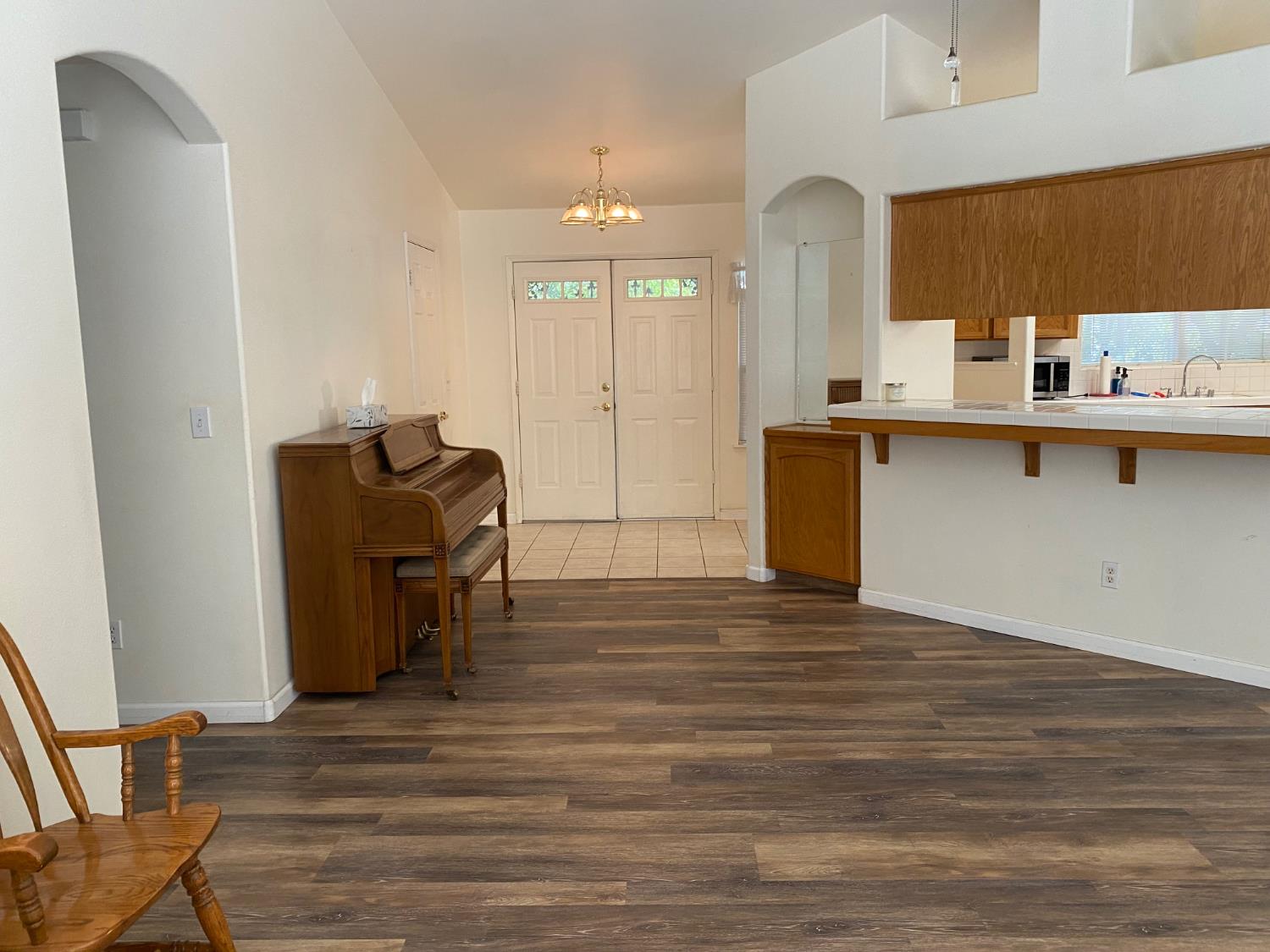 609 Merlot Avenue Madera, CA 93637 - Photo 10 of 45 a view of kitchen with cabinets and wooden floor