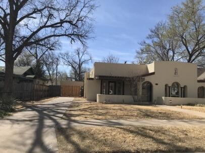 2311 16th Street Lubbock, TX 79401 - Photo 30 of 30 a view of a white house with a snow in front of it