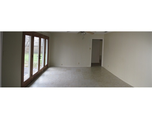 441 Waverly Drive Corpus Christi, TX 78412 - Photo 2 of 7 a black and white photo of a living room