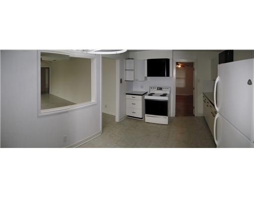 441 Waverly Drive Corpus Christi, TX 78412 - Photo 4 of 7 a open kitchen with a sink and refrigerator