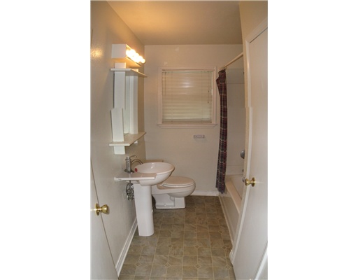 441 Waverly Drive Corpus Christi, TX 78412 - Photo 5 of 7 a bathroom with a sink a toilet and shower