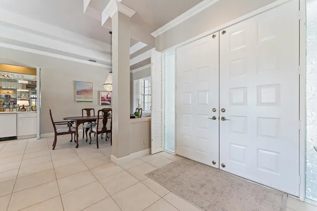 a view of a backyard with swimming pool
