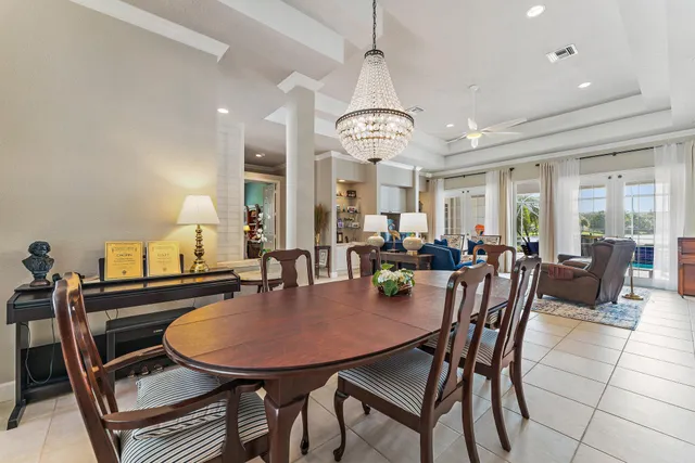 a spacious bathroom with a granite countertop sink toilet and shower