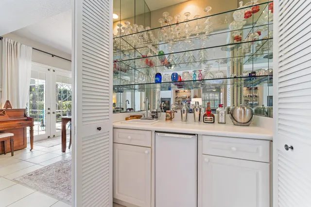 a bedroom with a bed and a table in it