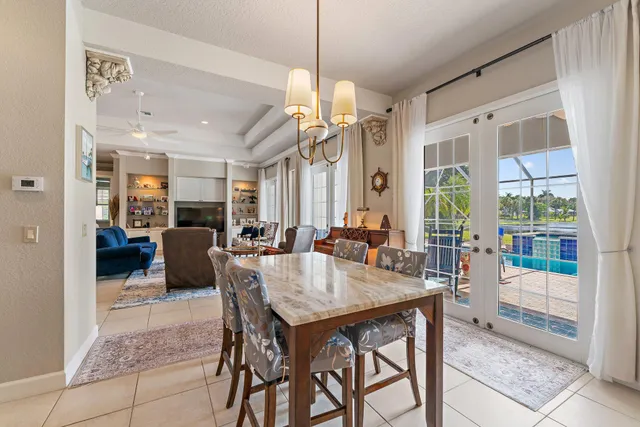 a view of a house with a yard porch and sitting area
