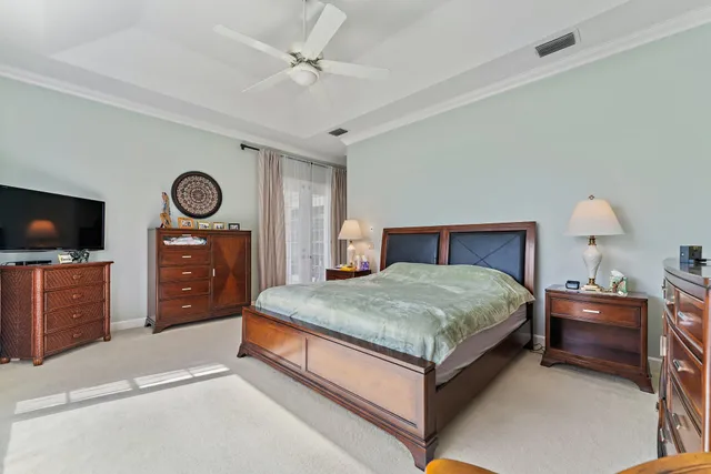 a view of house with backyard and garden