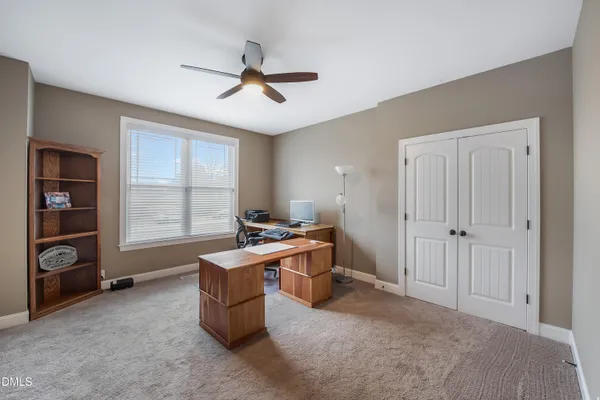 a view of a livingroom with a staircase