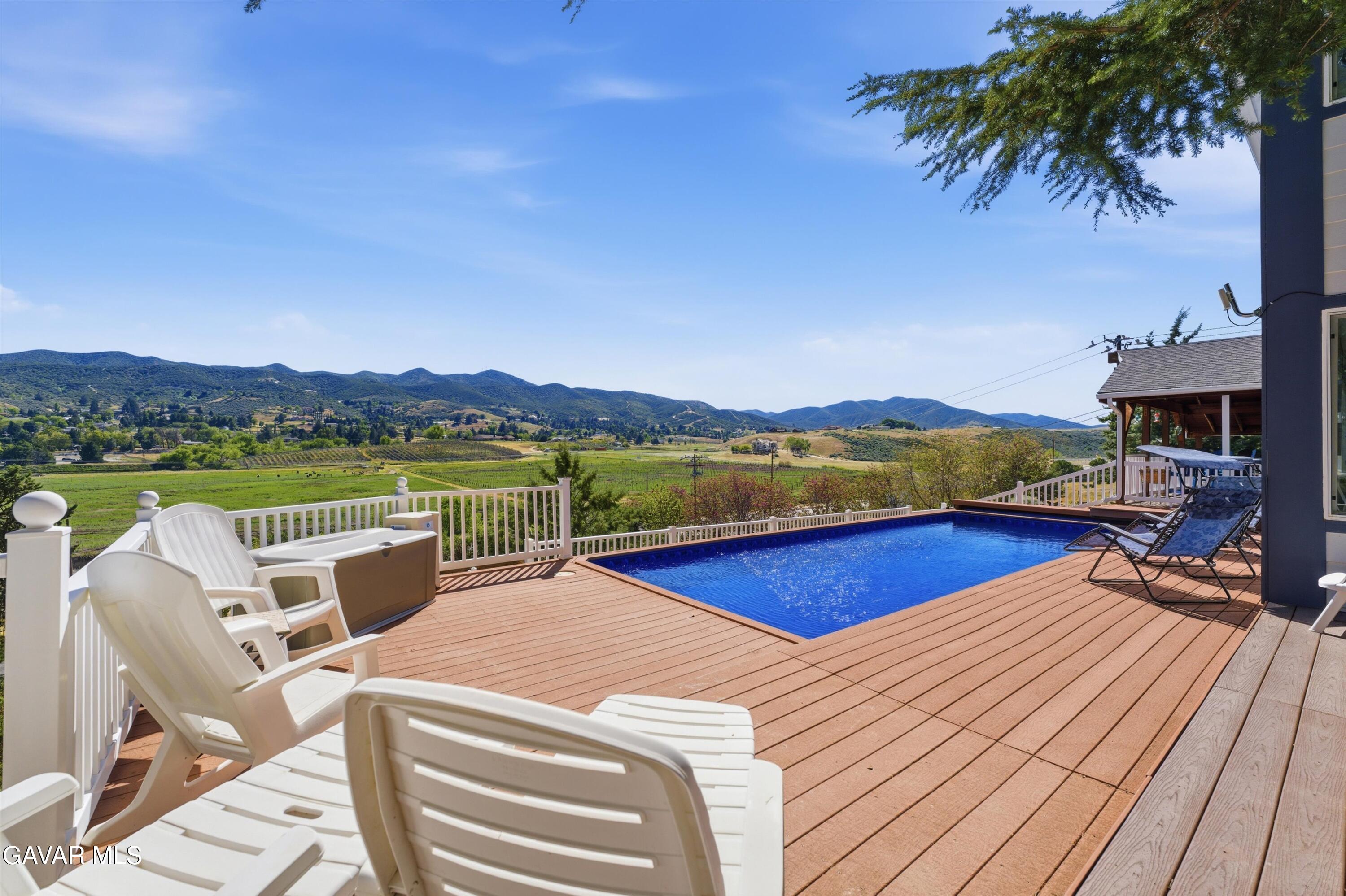 9065 Elizabeth Lake Road Leona Valley, CA 93551 - Photo 11 of 58 a view of swimming pool with lounge chair