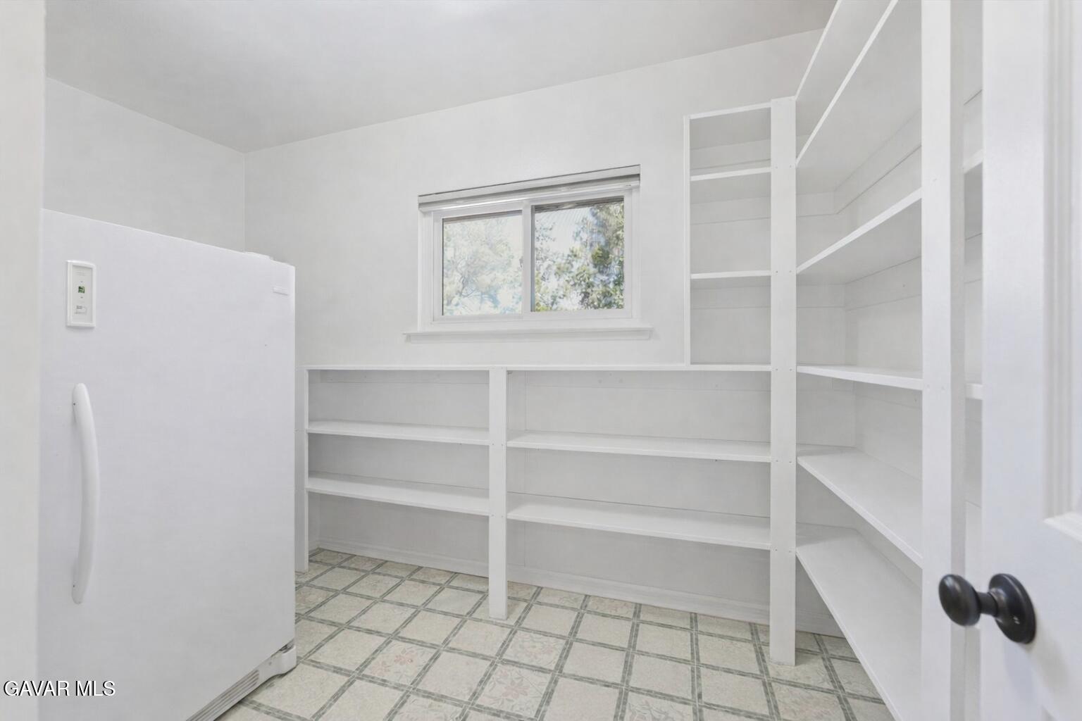 9065 Elizabeth Lake Road Leona Valley, CA 93551 - Photo 22 of 58 a view of an empty walk in closet