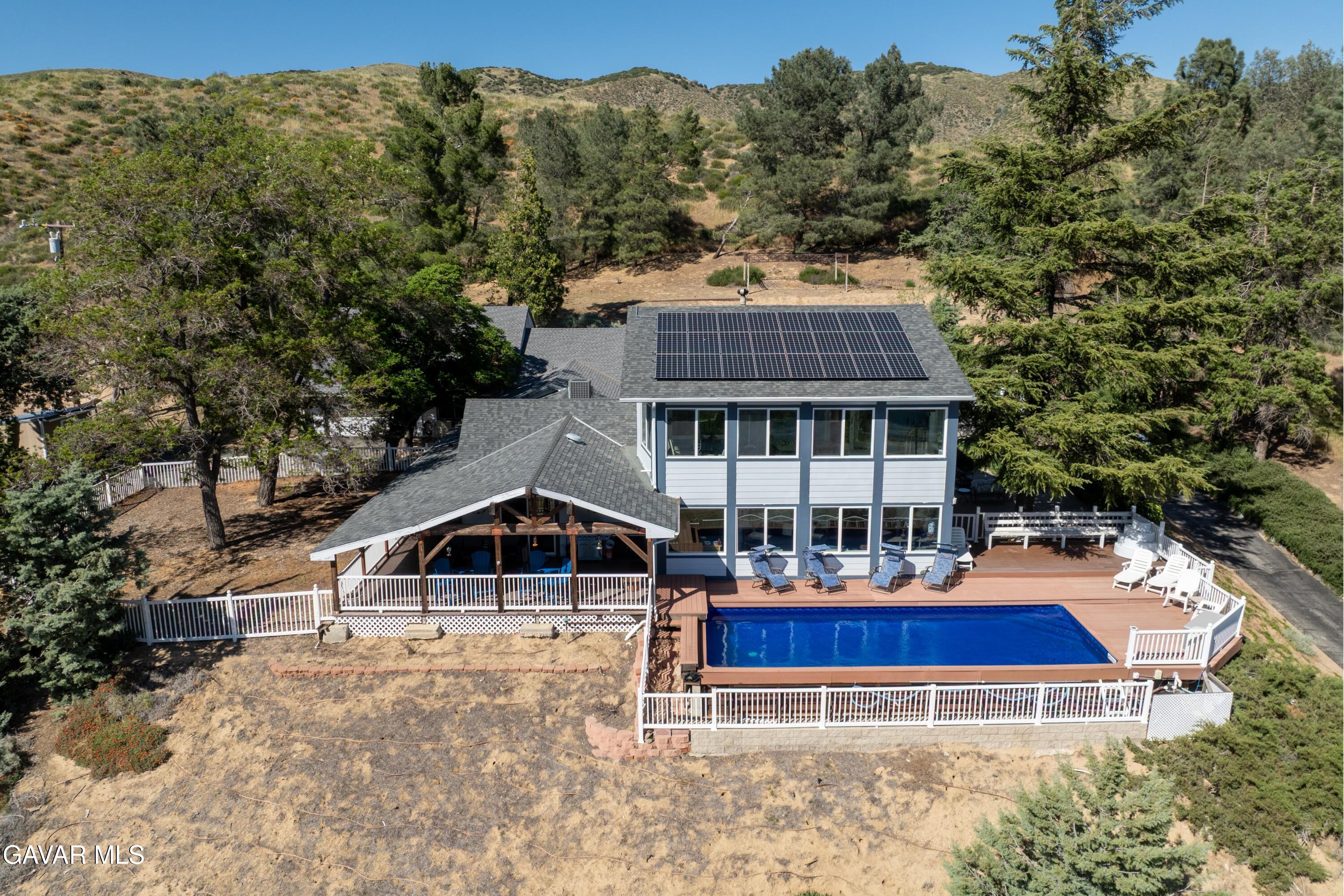9065 Elizabeth Lake Road Leona Valley, CA 93551 - Photo 42 of 58 swimming pool view with a seating space