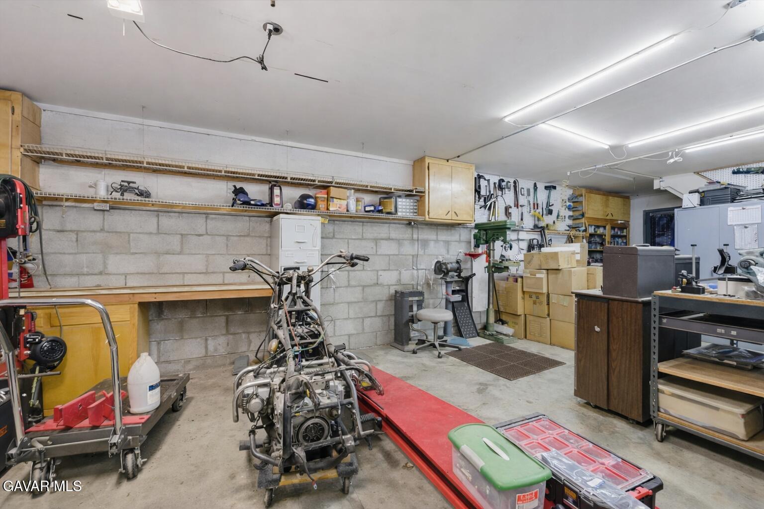 9065 Elizabeth Lake Road Leona Valley, CA 93551 - Photo 57 of 58 a room with lots of storage and utility