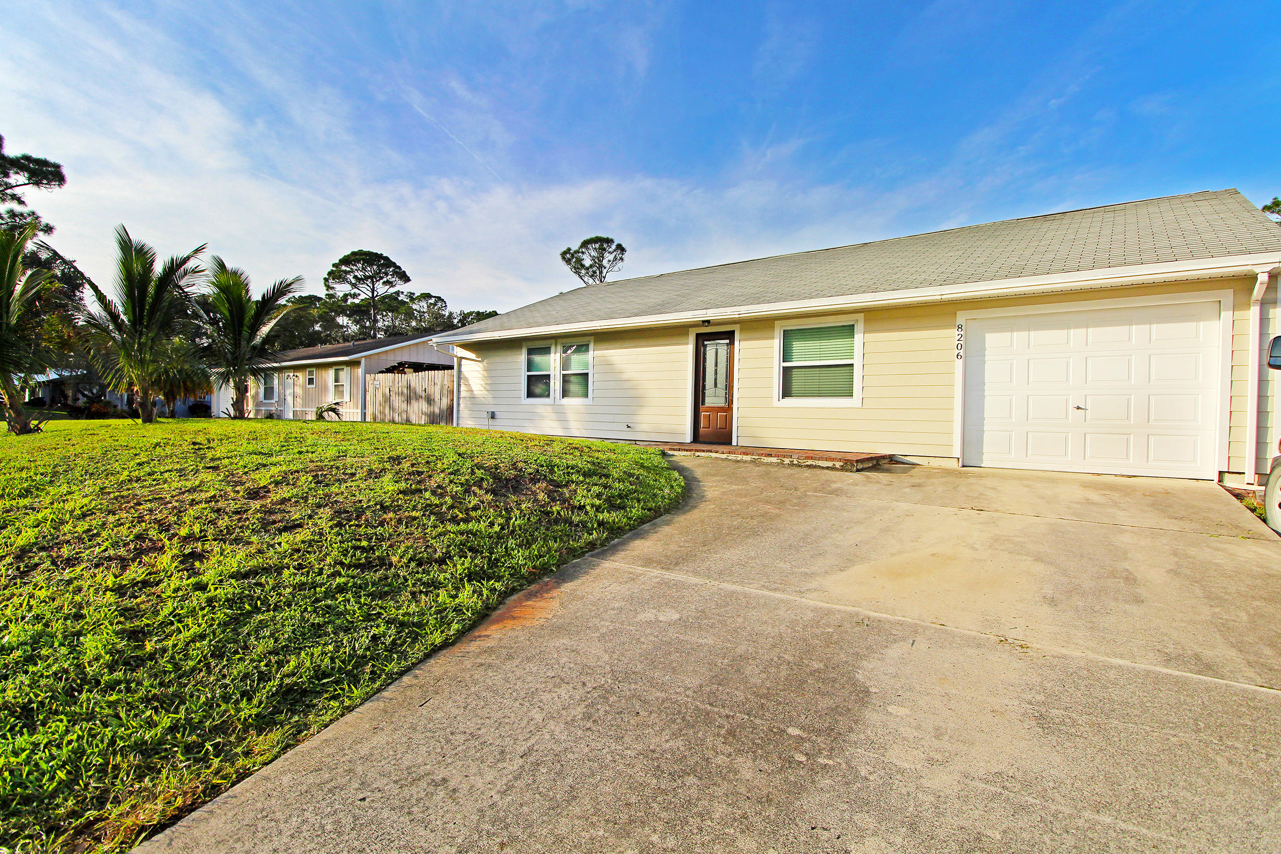 8206 Kenwood Road Fort Pierce, FL 34951 - Photo 1 of 30 Front 1