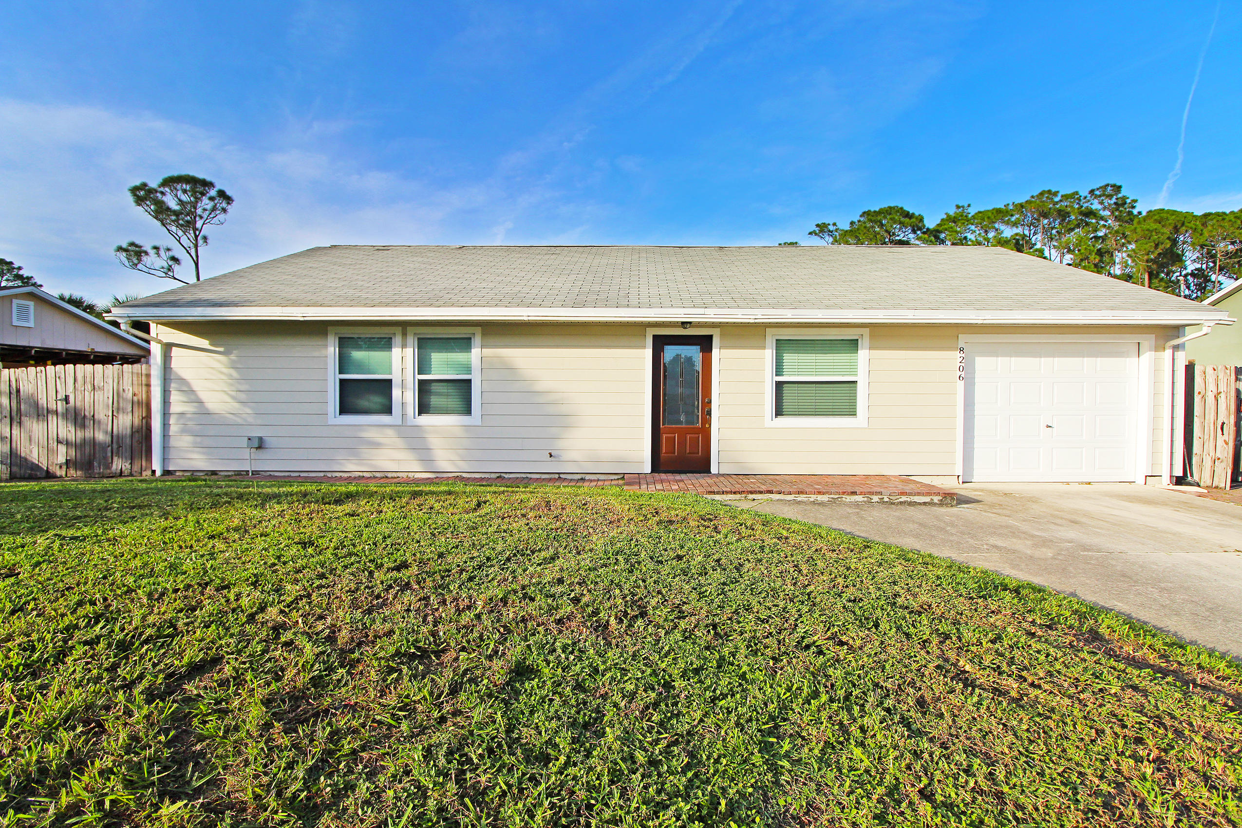 8206 Kenwood Road Fort Pierce, FL 34951 - Photo 2 of 30 Front 2