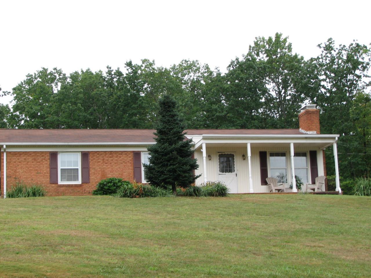 3401 Eton Road Hardy, VA 24101 - Photo 2 of 13 a front view of house with yard and green space