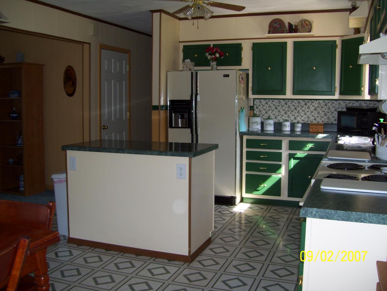 3401 Eton Road Hardy, VA 24101 - Photo 13 of 13 a kitchen with a refrigerator and a stove