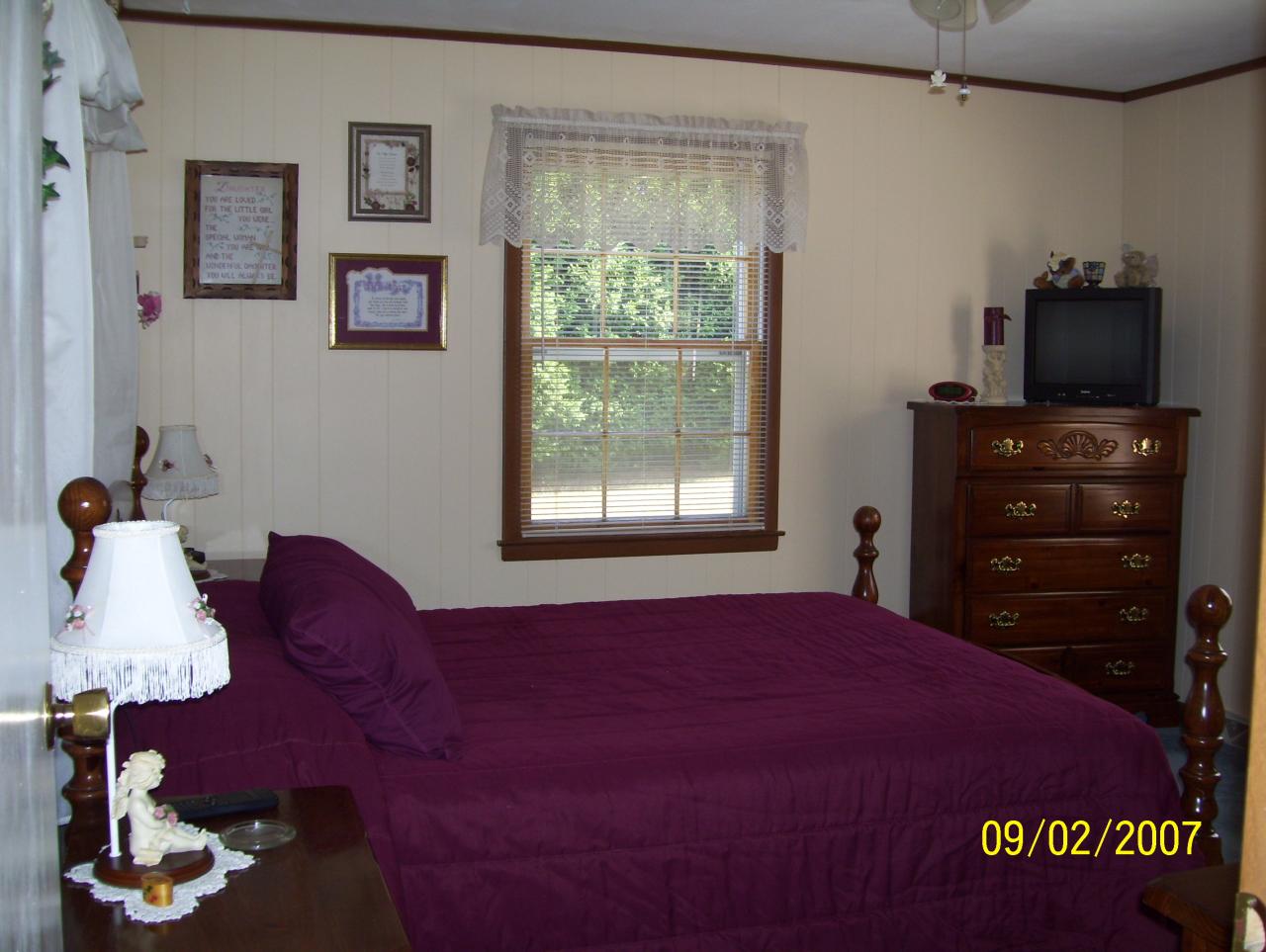 3401 Eton Road Hardy, VA 24101 - Photo 4 of 13 a bedroom with a bed and a window