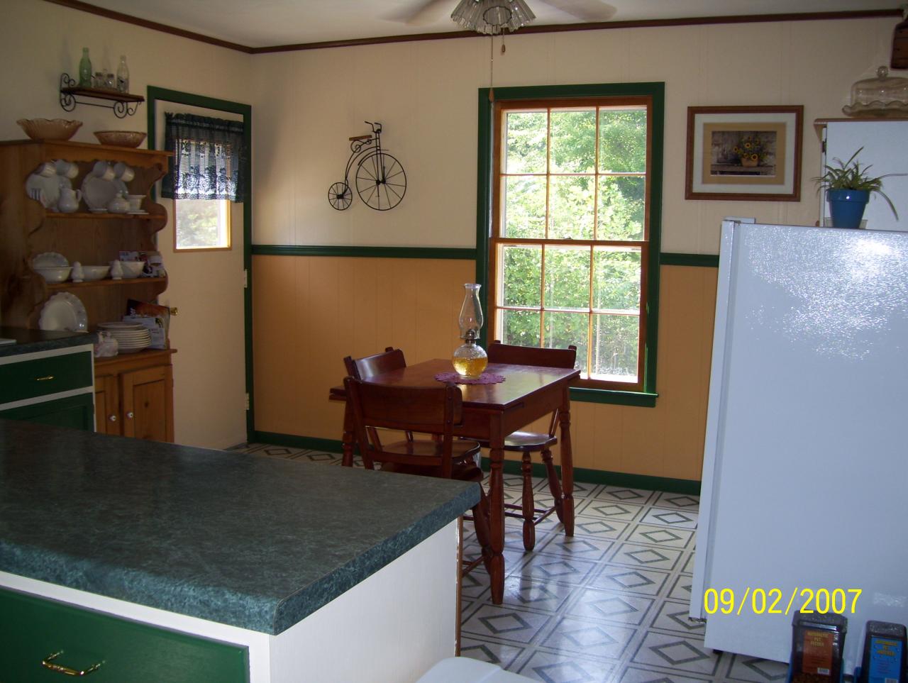 3401 Eton Road Hardy, VA 24101 - Photo 5 of 13 a view of a workspace with furniture and a window