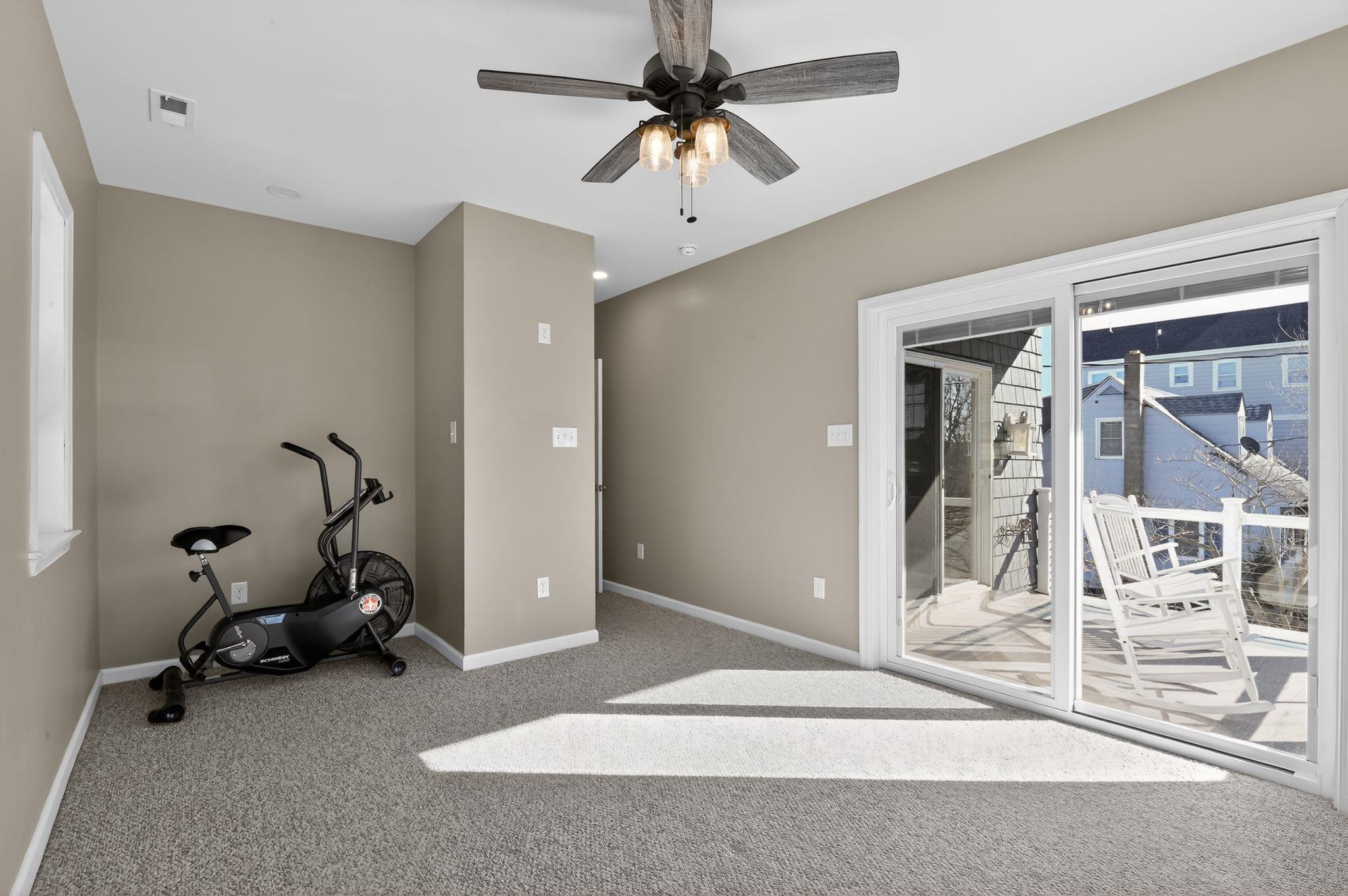 5 East Sumner Avenue Strathmere, NJ 08248 - Photo 20 of 35 a bedroom with furniture and a window