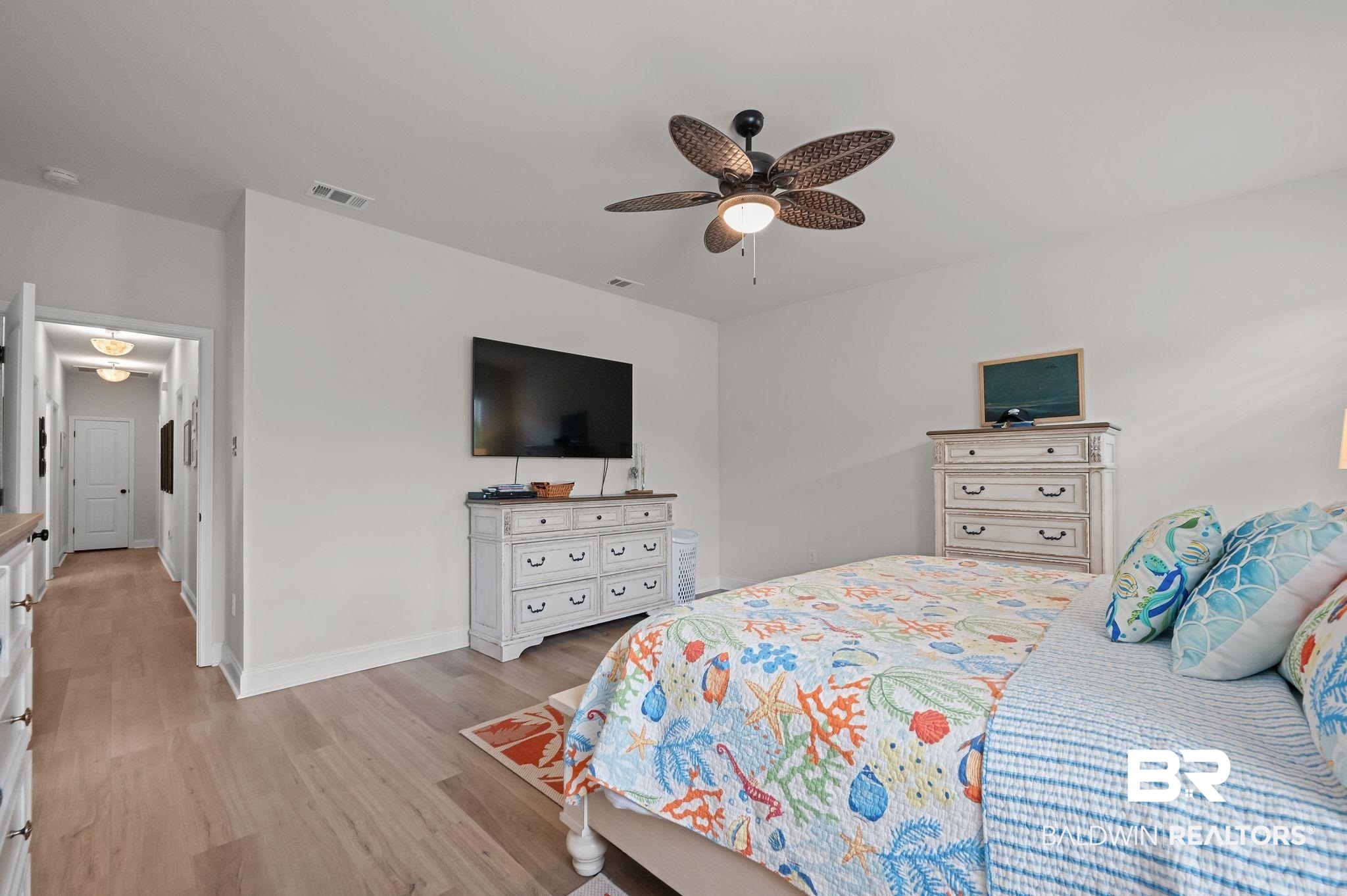 1165 Stella Road Foley, AL 36535 - Photo 18 of 42 Bedroom featuring light wood-type flooring, baseboards, and a ceiling fan