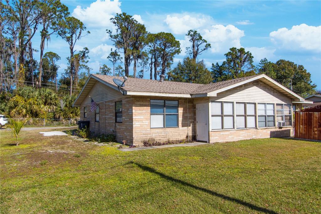 709 Mosley Road Lake Alfred, FL 33850 - Photo 17 of 17 front view of a house with a yard
