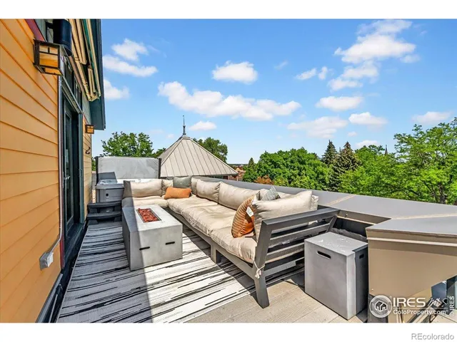 a view of a chairs and table in the patio