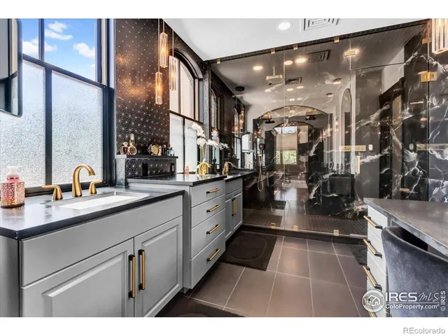 a open kitchen with sink and cabinets