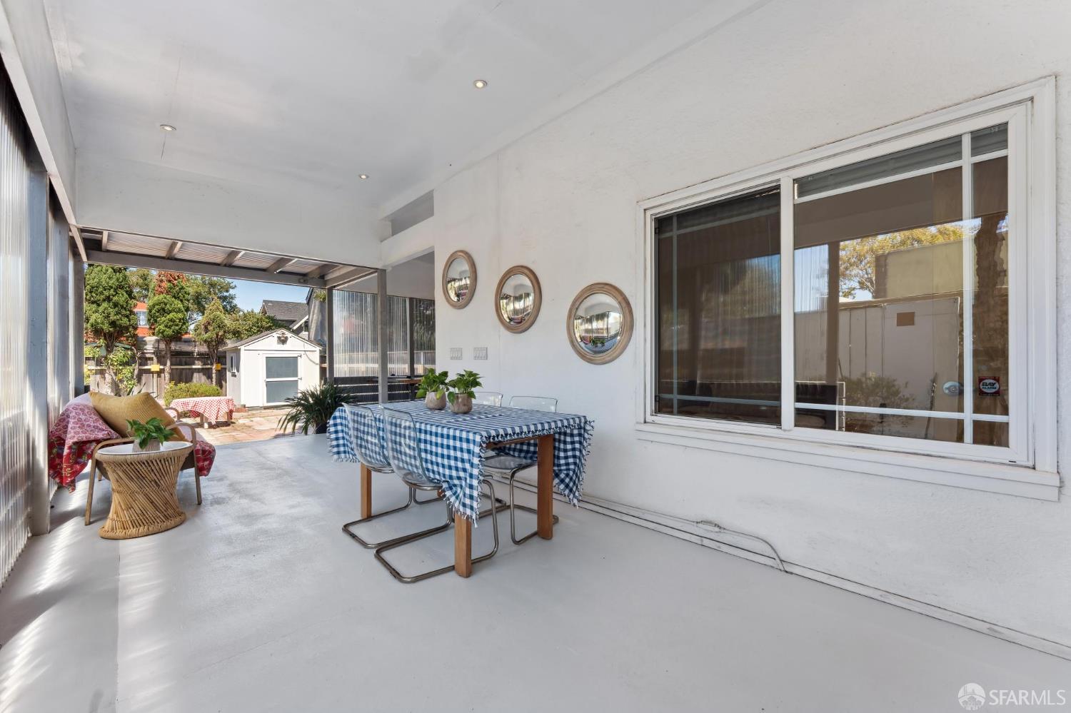 1109 Channing Way Berkeley, CA 94702 - Photo 15 of 24 a living room with furniture and a window
