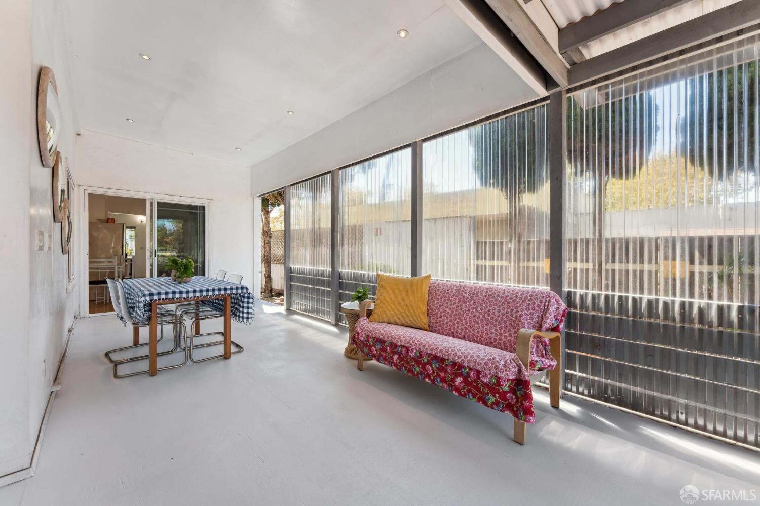 1109 Channing Way Berkeley, CA 94702 - Photo 18 of 24 a living room with furniture and a large window