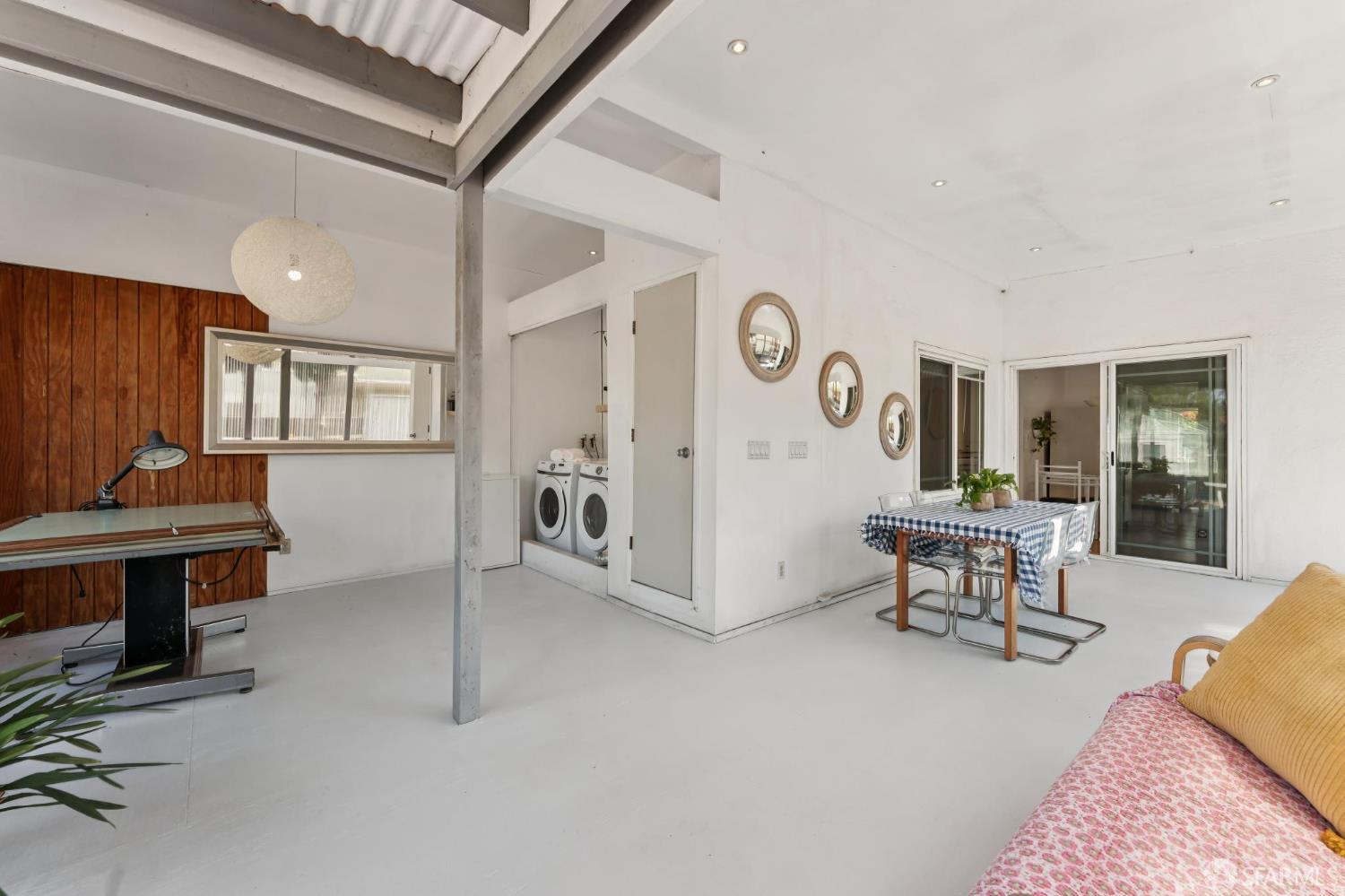 1109 Channing Way Berkeley, CA 94702 - Photo 19 of 24 a living room with furniture and a table