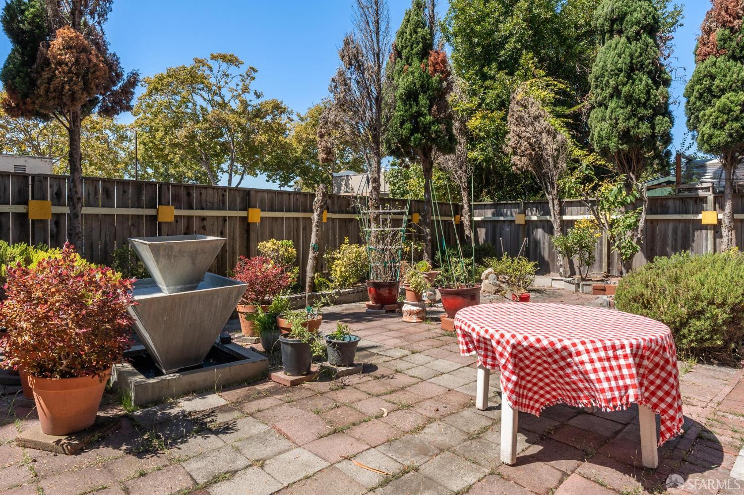 1109 Channing Way Berkeley, CA 94702 - Photo 24 of 24 a view of outdoor sitting area with furniture and wooden fence