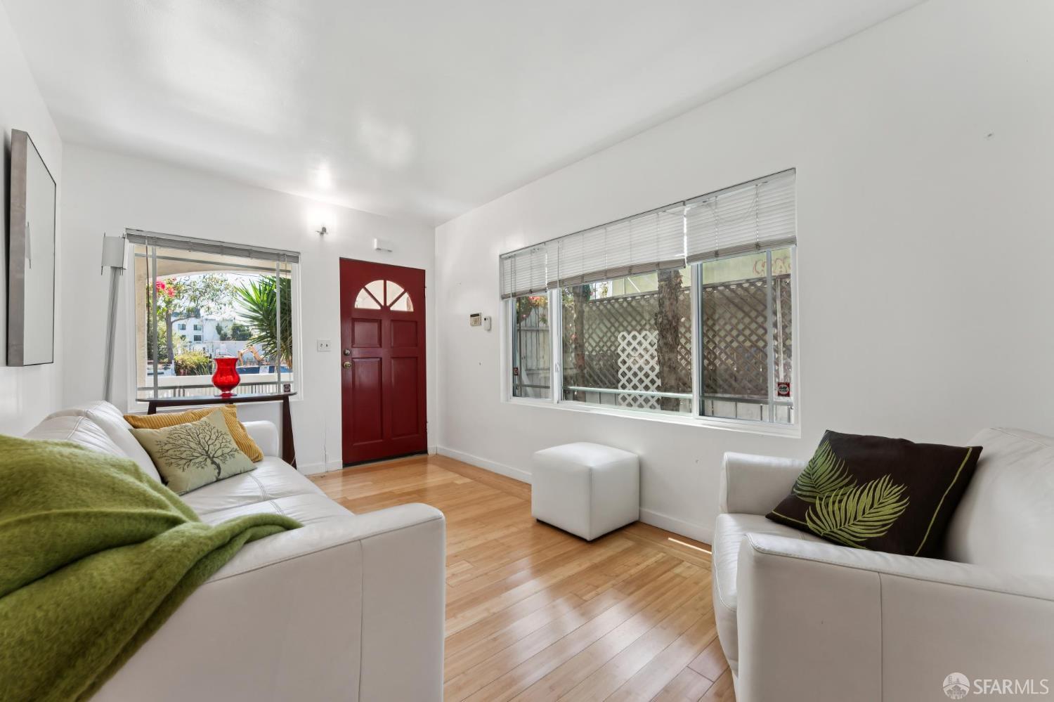 1109 Channing Way Berkeley, CA 94702 - Photo 6 of 24 a living room with furniture and a large window