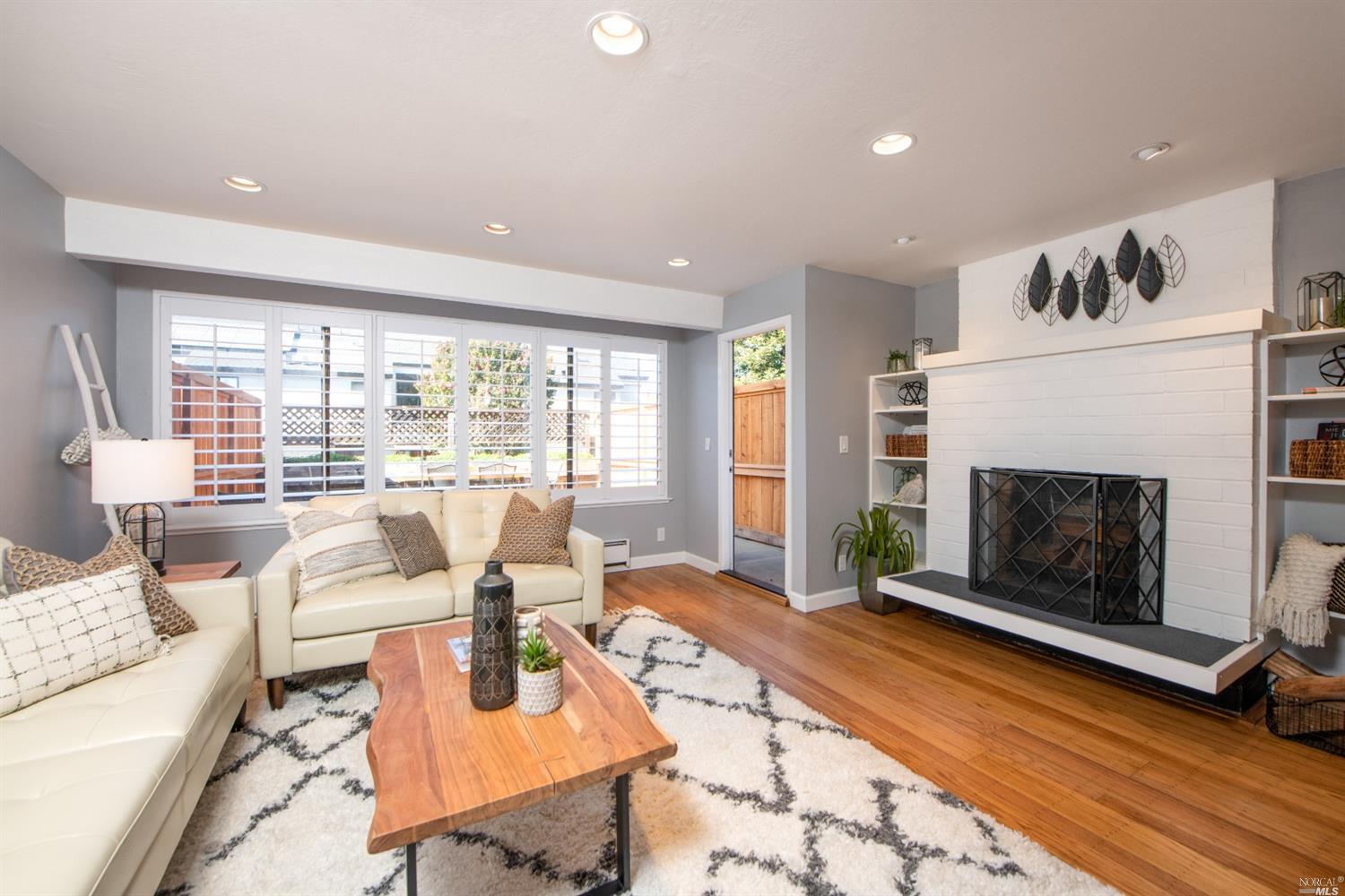 52 Park Terrace Mill Valley, CA 94941 - Photo 1 of 1 a living room with fireplace furniture and a fireplace