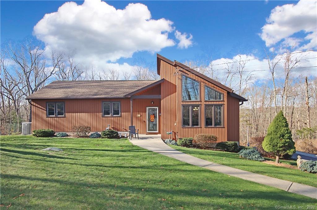 36 Oakcrest Road Oxford, CT 06478 - Photo 1 of 1 a front view of a house with garden