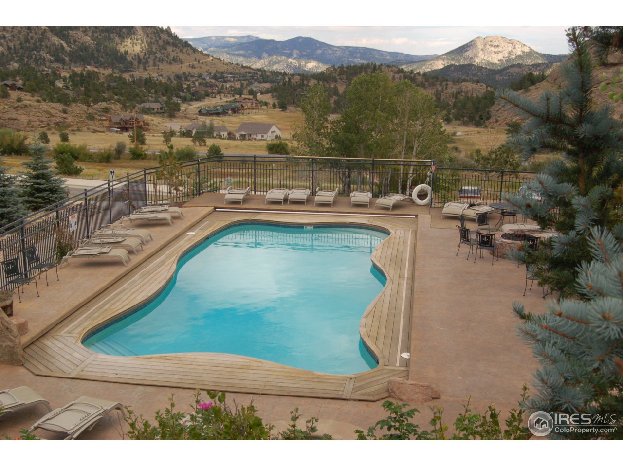 2625 Marys Lake Road, Unit 101 Estes Park, CO 80517 - Photo 19 of 25 a view of a swimming pool with a mountain