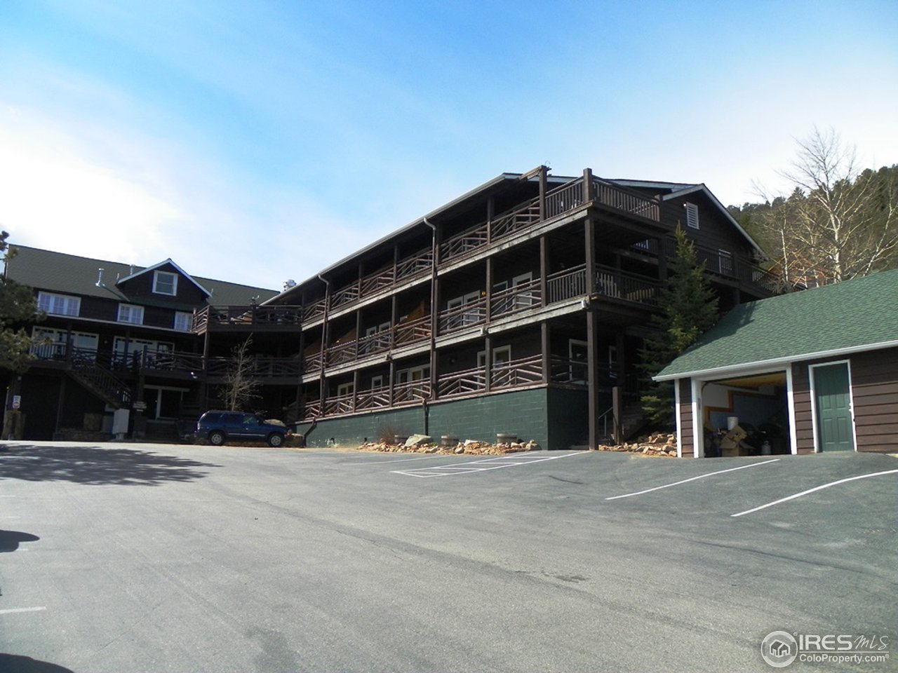 2625 Marys Lake Road, Unit 101 Estes Park, CO 80517 - Photo 10 of 25 a view of a building with a street
