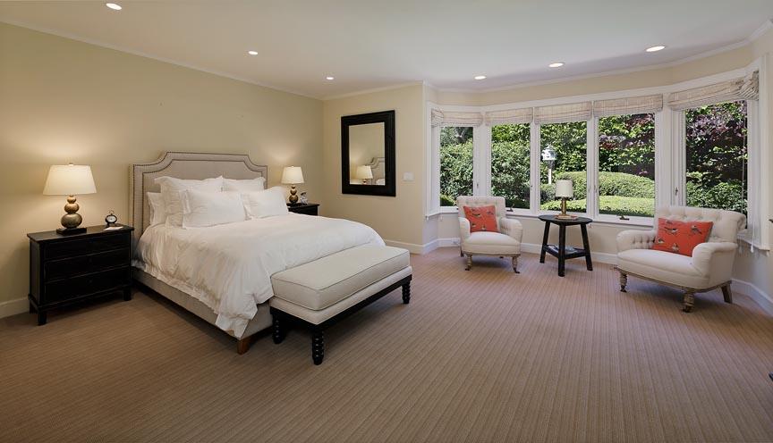 1565 East Valley Road Montecito, CA 93108 - Photo 16 of 31 a bedroom with a bed and large windows