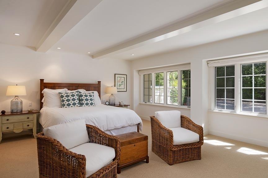 1565 East Valley Road Montecito, CA 93108 - Photo 17 of 31 a bedroom with a bed and a couch with window