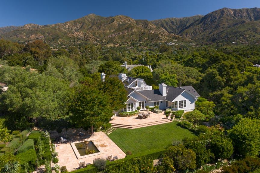 1565 East Valley Road Montecito, CA 93108 - Photo 2 of 31 a view of a house with a yard and sitting area