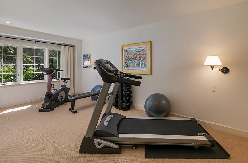 1565 East Valley Road Montecito, CA 93108 - Photo 22 of 31 a room with gym equipment and a large window