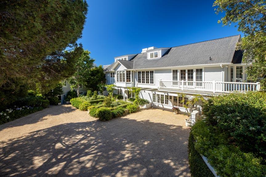 1565 East Valley Road Montecito, CA 93108 - Photo 24 of 31 a front view of a house with a garden and yard