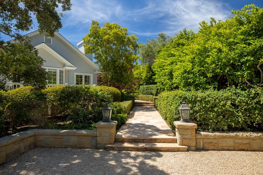 1565 East Valley Road Montecito, CA 93108 - Photo 5 of 31 a view of a house with potted plants