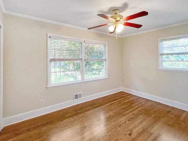 2711 Fairlane Drive Atlanta, GA 30340 - Photo 24 of 31 a view of an empty room with window and a chandelier fan